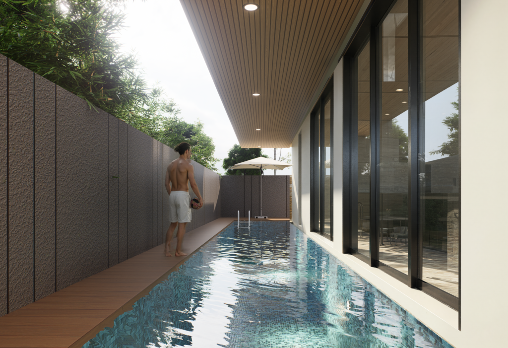 Narrow lap swimming pool beside a modern house with timber ceiling